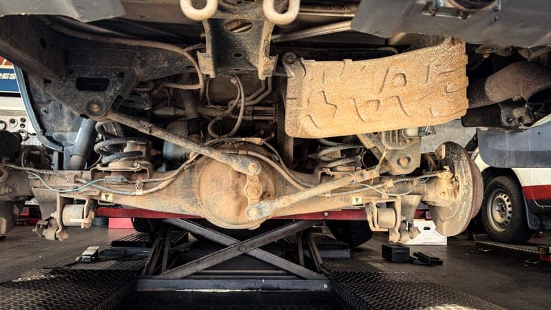 The underside of a vehicle, the area undercoating protects - a stand-in for the Fluid Film Rust and Corrosion Protection, not a photograph of this model